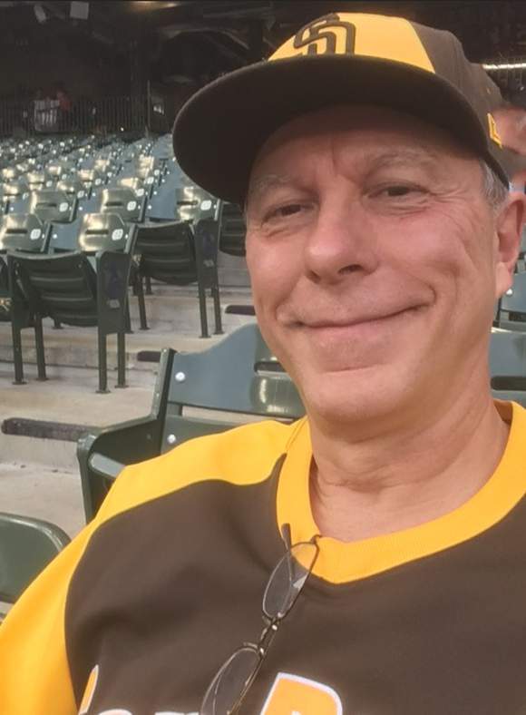 Jim Ripley, who benefited from a PVI ablation, enjoying a baseball game.