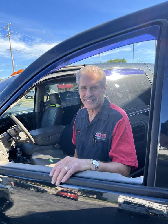 Steve looking into the camera out of his truck